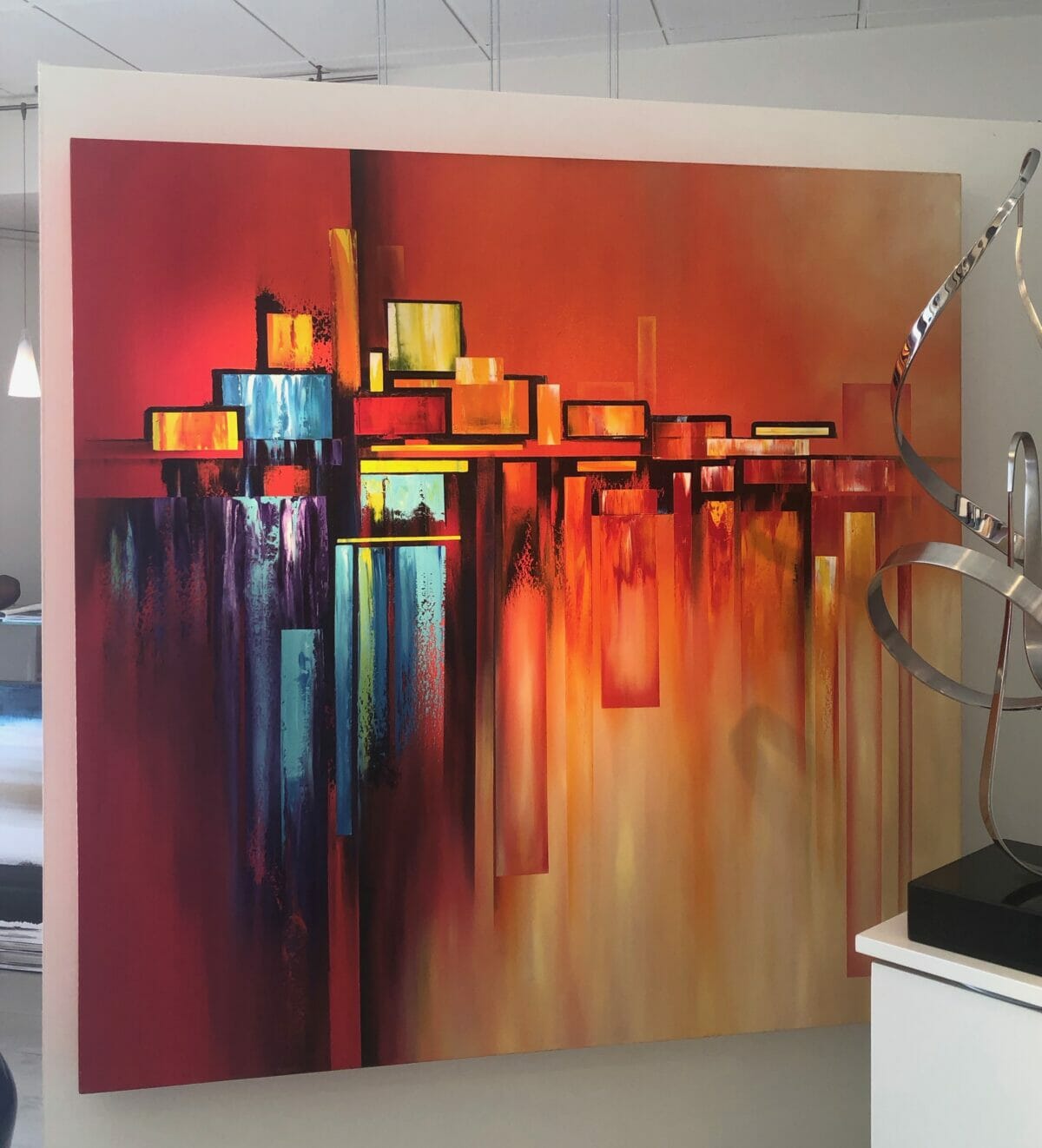 Abstract geometric painting with vibrant warm hues